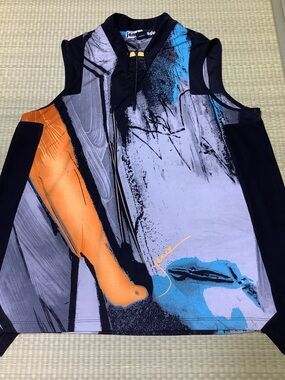 jamie sadock Black Top with Blue and Orange Accents Athletic Golf